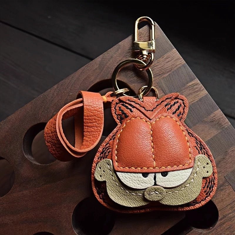 Handcrafted Leather Orange Cat Bag Charm – Cartoon Cat Design, Full - Grain Lambskin, Playful Accessory for Keys or Bags, Thoughtful Gift for Women - Tomlynam