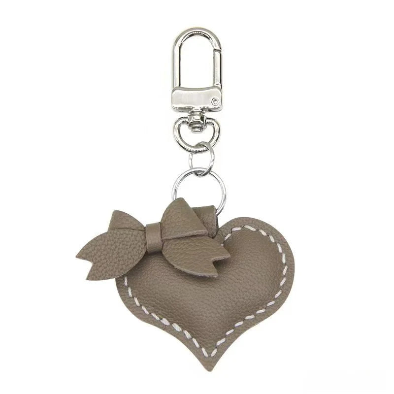 Heart-Shaped Bow Tie Leather Bag Charm | Minimalist Design | Handcrafted | Versatile and Elegant Gift Hook Style