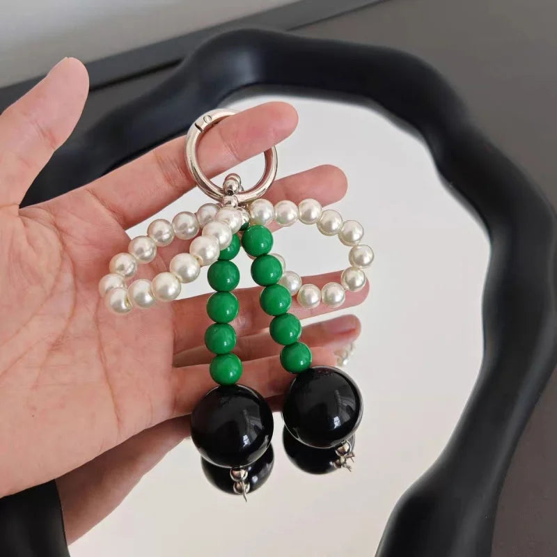 Big Cherry Beaded Bag Charm – Handmade Statement Fruit Keychain with Bowknot Design | Trendy Chunky Pendant for Totes, Backpacks & Gifts