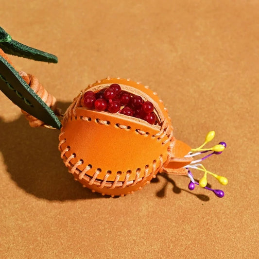 Hand-stitched Leather Pomegranate Charm – Premium Vegetable-tanned Leather Bag Pendant | Creative Accessory for Bags & Keychains