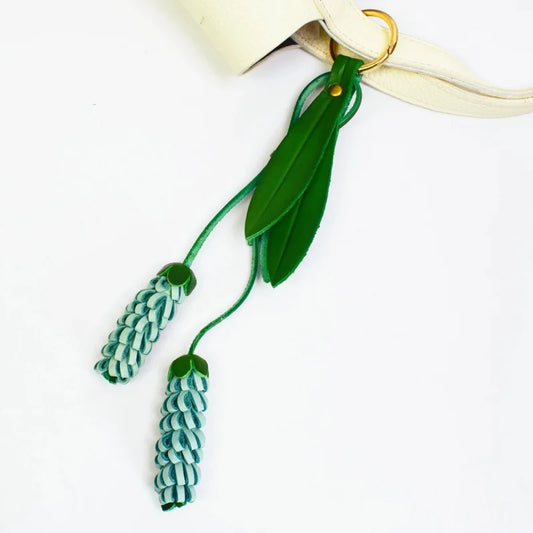 Handcrafted “Happiness Bloom” Leather Bag Charm – 3D Full-Grain Cowhide Floral Tassel Pendant | Artisan Botanical Handbag Accessory