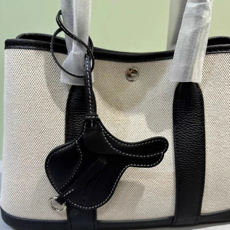 Equestrian - Inspired Saddle Bag Charm – Handcrafted French Goatskin Pendant | Unique Keychain Accent | Timeless Equestrian Style - Tomlynam