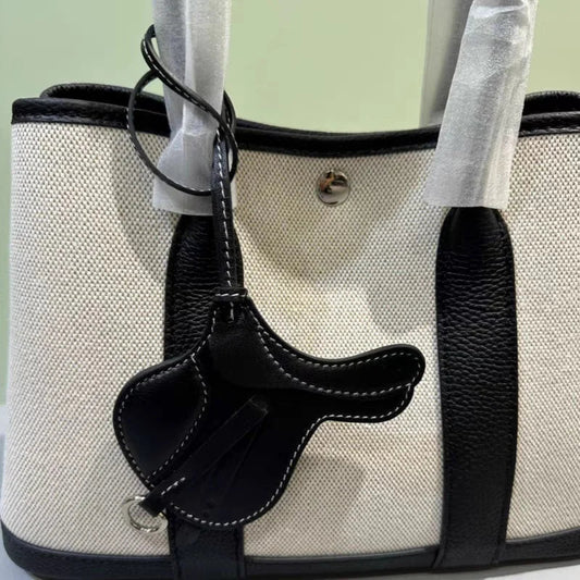 Equestrian - Inspired Saddle Bag Charm – Handcrafted French Goatskin Pendant | Unique Keychain Accent | Timeless Equestrian Style - Tomlynam