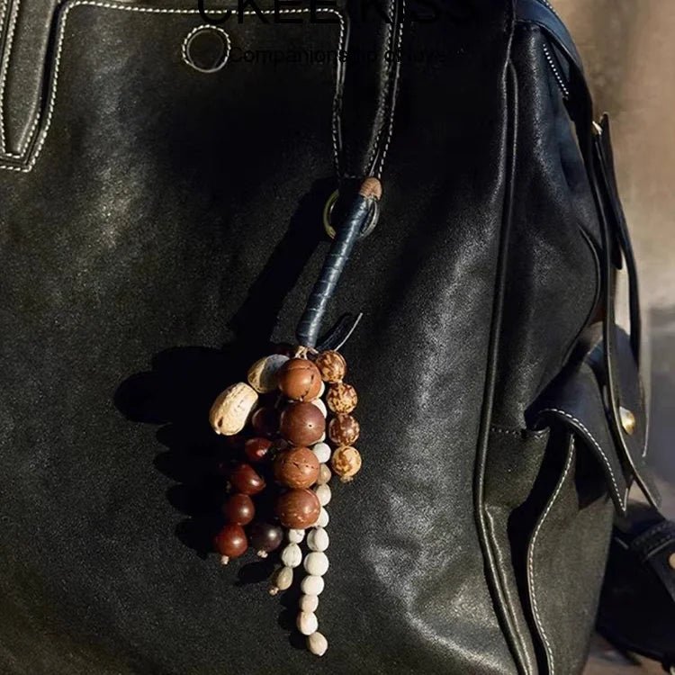 Fortune Seeds Natural Beaded Bag Charm – Handcrafted Lucky Pendant | Unique Artisanal Accessory | Elegant Statement for Handbags - Tomlynam